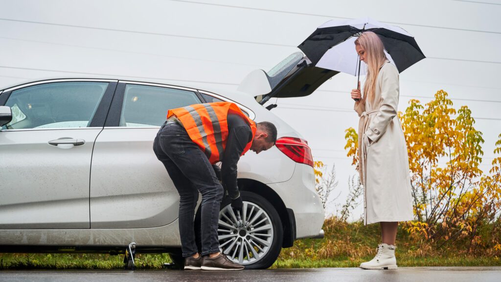 auto mechanic repairing woman car on the road 2025 01 16 22 38 28 utc 2