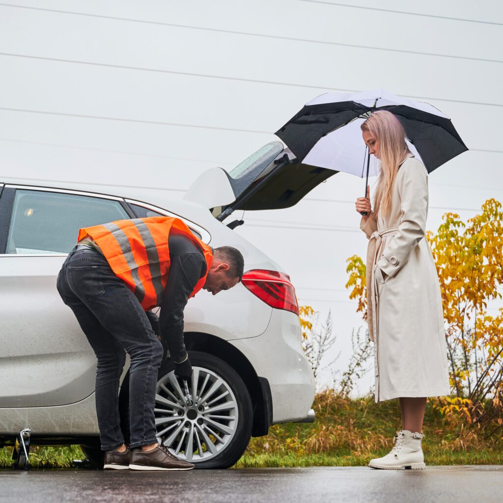 auto mechanic repairing woman car on the road 2025 01 16 22 38 28 utc 3